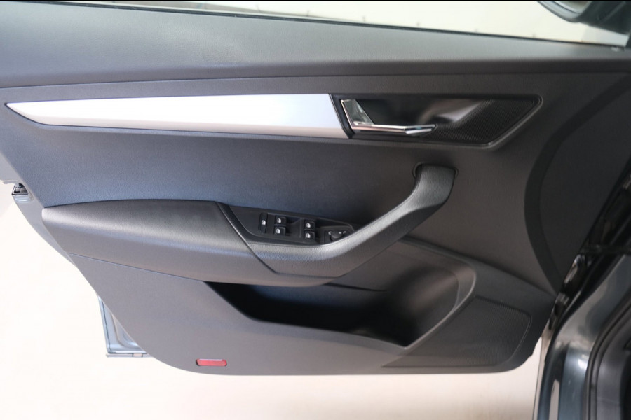 Škoda Karoq 1.0 TSI Style - Airco, Cruise, Navi, PDC, Carplay, Trekhaak.