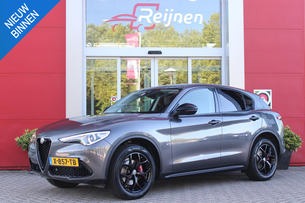 Alfa Romeo Stelvio 2.0 T 280PK Q4 AWD B-Tech | DRIVER ASSISTENCE PACK2: | ACHTERUITRIJCAMERA | PARKEERSENSOREN VOOR / ACHTER | DODEHOEKDETECTIE | DIMMENDE BINNENSPIEGEL | CONVENIENCE PACK: | KEYLESS ENTRY / START | WARMTE WERENDE VOORRUIT | ELEKTRSICHE STOELVERSTELLING MET GEHEUGEN | ELEKTRISCH VERWARMEDE VOORSTOELEN | ELEKTRISCH VERWARMBAAR STUURWIEL | LEDEREN BEKLEDING | RODE REMKLAUWEN | 19"INCH LICHTMETALEN VELGEN | BI-XENON KOPLAMPEN MET SPROEIINSTALATIE | ELEKTRISCHE ACHTERKLEP | NAVIGATIE | DAB+ RADIO | ADAPTIVE CRUISE CONTROL |