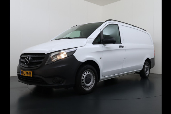 Mercedes-Benz Vito 114CDI 136pk AUT-7 L2 Lang Trekhaak Euro-6 Airco Cruise Control Bluetooth Lane Asist Pdc Betonplex Vloer Wandbetimmering Kast inbouw Achter+Geblindeerde-Raam Schuifdeur 1e Eigenaar 2.000KG Trekgewicht Nette Bus!