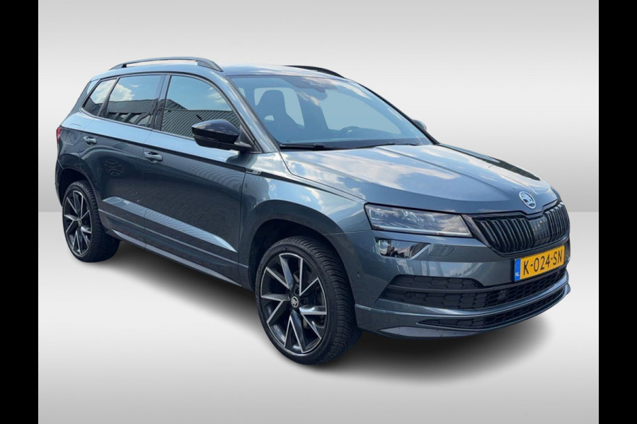 Škoda Karoq 1.5 TSI ACT Sportline Business / Camera / CarPlay / Keyless / 19'' / Stoel+Stuurverwarming / Dodehoek / DAB / ACC