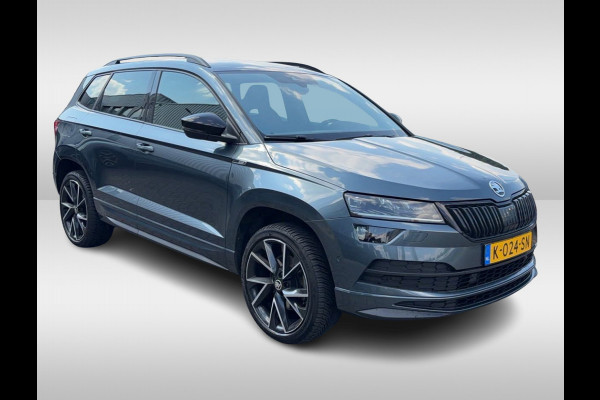 Škoda Karoq 1.5 TSI ACT Sportline Business / Camera / CarPlay / Keyless / 19'' / Stoel+Stuurverwarming / Dodehoek / DAB / ACC