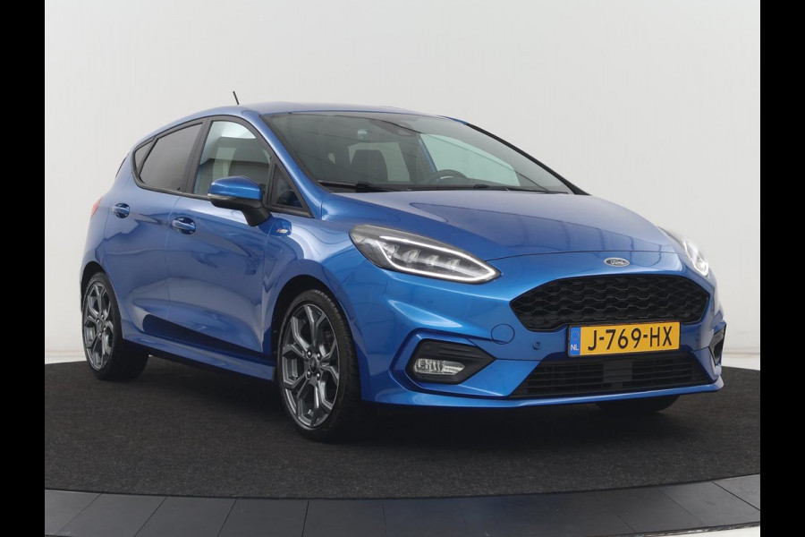 Ford Fiesta 1.0 EcoBoost ST-Line | Stoel & stuurverwarming | Adaptive cruise | Camera | Carplay | Full LED | Half leder | Side Assist | Navigatie | Park Assist | Climate control | Bluetooth