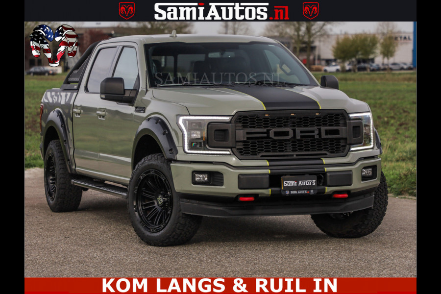 Ford USA F-150 5.0 V8 4X4 | MAT OLIVE GREEN | ZEER DIK | CAMERA | 3500KG | PANORAMA | LEDER | GO RHINO ROLLBAR | CRUISE CONTROL | PRINS LPG | BAKFLIP COVER | Deze pick-up is leverbaar met zowel een groot rijbewijs (C) als een klein rijbewijs (B). Laat ons weten wat jouw voorkeur is.