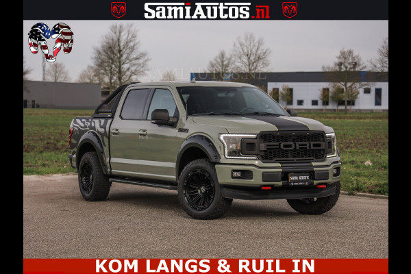 Ford USA F-150 5.0 V8 4X4 | MAT OLIVE GREEN | ZEER DIK | CAMERA | 3500KG | PANORAMA | LEDER | GO RHINO ROLLBAR | CRUISE CONTROL | PRINS LPG | BAKFLIP COVER | Deze pick-up is leverbaar met zowel een groot rijbewijs (C) als een klein rijbewijs (B). Laat ons weten wat jouw voorkeur is.