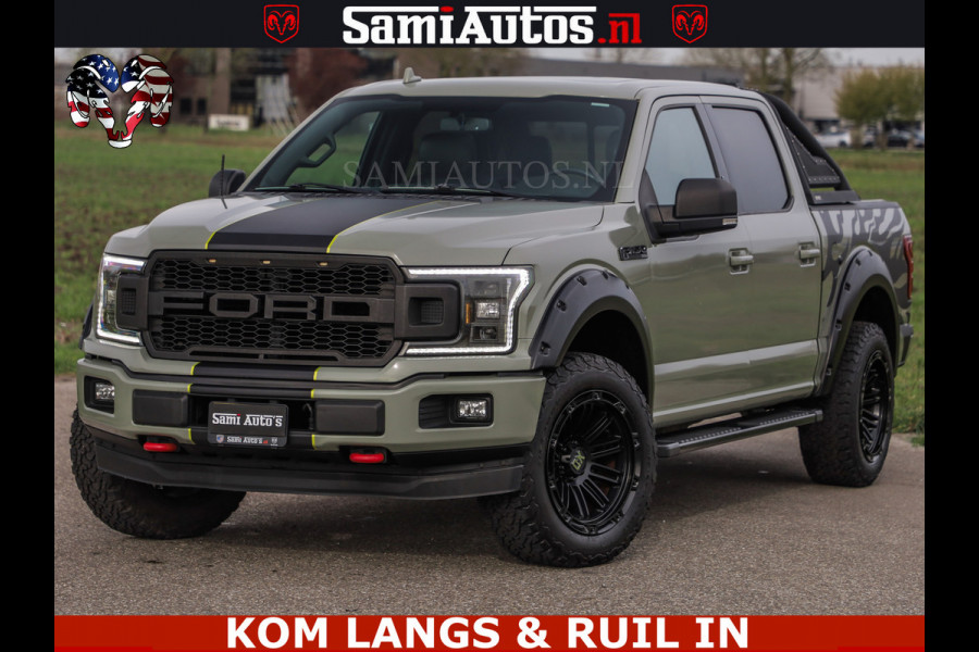 Ford USA F-150 5.0 V8 4X4 | MAT OLIVE GREEN | ZEER DIK | CAMERA | 3500KG | PANORAMA | LEDER | GO RHINO ROLLBAR | CRUISE CONTROL | PRINS LPG | BAKFLIP COVER | Deze pick-up is leverbaar met zowel een groot rijbewijs (C) als een klein rijbewijs (B). Laat ons weten wat jouw voorkeur is.