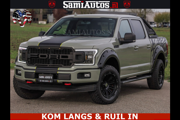 Ford USA F-150 5.0 V8 4X4 | MAT OLIVE GREEN | ZEER DIK | CAMERA | 3500KG | PANORAMA | LEDER | GO RHINO ROLLBAR | CRUISE CONTROL | PRINS LPG | BAKFLIP COVER | Deze pick-up is leverbaar met zowel een groot rijbewijs (C) als een klein rijbewijs (B). Laat ons weten wat jouw voorkeur is.