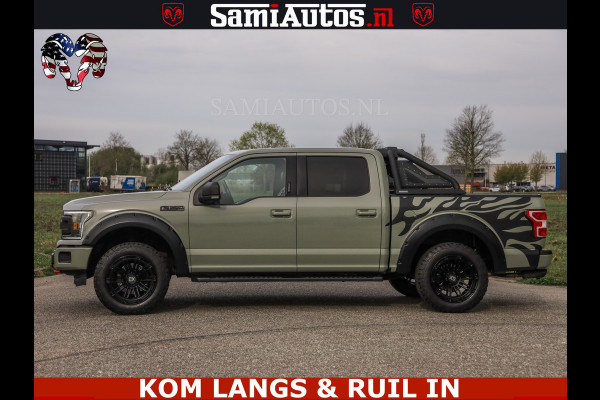 Ford USA F-150 5.0 V8 4X4 | MAT OLIVE GREEN | ZEER DIK | CAMERA | 3500KG | PANORAMA | LEDER | GO RHINO ROLLBAR | CRUISE CONTROL | PRINS LPG | BAKFLIP COVER | Deze pick-up is leverbaar met zowel een groot rijbewijs (C) als een klein rijbewijs (B). Laat ons weten wat jouw voorkeur is.