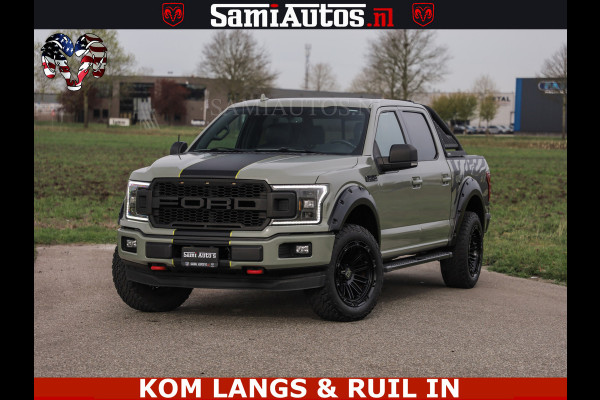 Ford USA F-150 5.0 V8 4X4 | MAT OLIVE GREEN | ZEER DIK | CAMERA | 3500KG | PANORAMA | LEDER | GO RHINO ROLLBAR | CRUISE CONTROL | PRINS LPG | BAKFLIP COVER | Deze pick-up is leverbaar met zowel een groot rijbewijs (C) als een klein rijbewijs (B). Laat ons weten wat jouw voorkeur is.
