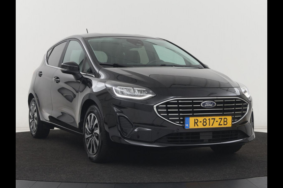 Ford Fiesta 1.0 EcoBoost Hybrid Titanium X | Carplay | Camera | Climate control | Keyless | Full LED | Cruise control | Bluetooth | Park Assist | Getint glas | Origineel NL