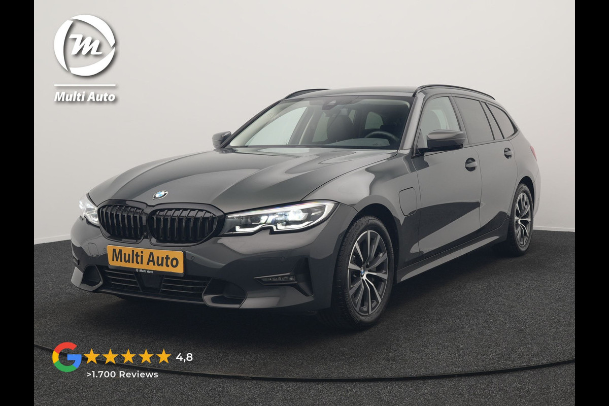 BMW 3 Serie Touring 330e Sport Line PHEV 293pk Dealer O.H. DRAVITGRAU | Trekhaak Af Fabriek | Adaptive Cruise | 360 Camera | Lederen Sportstoelen Memory & Verwarmd | Sfeerverlichting | Stuur Verwarmd | Apple Carplay | Navigatie | DAB | Plug In Hybrid |