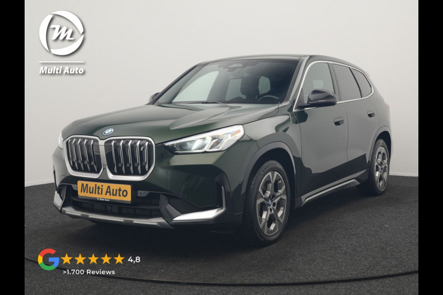BMW iX1 xDrive30 xLine 67 kWh 306pk Dealer O.H. | Trekhaak Af Fabriek | Camera | Adaptief Onderstel | Lederen Sportstoelen Memory & Verwarmd | Sfeerverlichting | Apple Carplay | Blis | Navigatie | DAB | Virtual | Cruise Control |