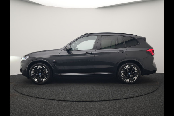 BMW iX3 M Sport 80 kWh 286pk Dealer O.H. | Trekhaak Af Fabriek | Panodak | Head Up | Adaptive Cruise | 360 Camera | Harman / Kardon | Lederen Sportstoelen Memory & Verwarmd | Laser LED | Stuur Verwarmd | Keyless | Blis | Sfeerverlichting | 20"L.M |