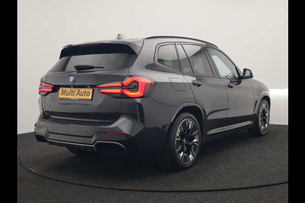 BMW iX3 M Sport 80 kWh 286pk Dealer O.H. | Trekhaak Af Fabriek | Panodak | Head Up | Adaptive Cruise | 360 Camera | Harman / Kardon | Lederen Sportstoelen Memory & Verwarmd | Laser LED | Stuur Verwarmd | Keyless | Blis | Sfeerverlichting | 20"L.M |