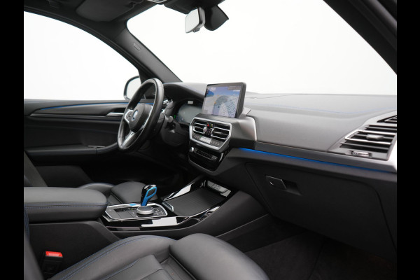 BMW iX3 M Sport 80 kWh 286pk Dealer O.H. | Trekhaak Af Fabriek | Panodak | Head Up | Adaptive Cruise | 360 Camera | Harman / Kardon | Lederen Sportstoelen Memory & Verwarmd | Laser LED | Stuur Verwarmd | Keyless | Blis | Sfeerverlichting | 20"L.M |