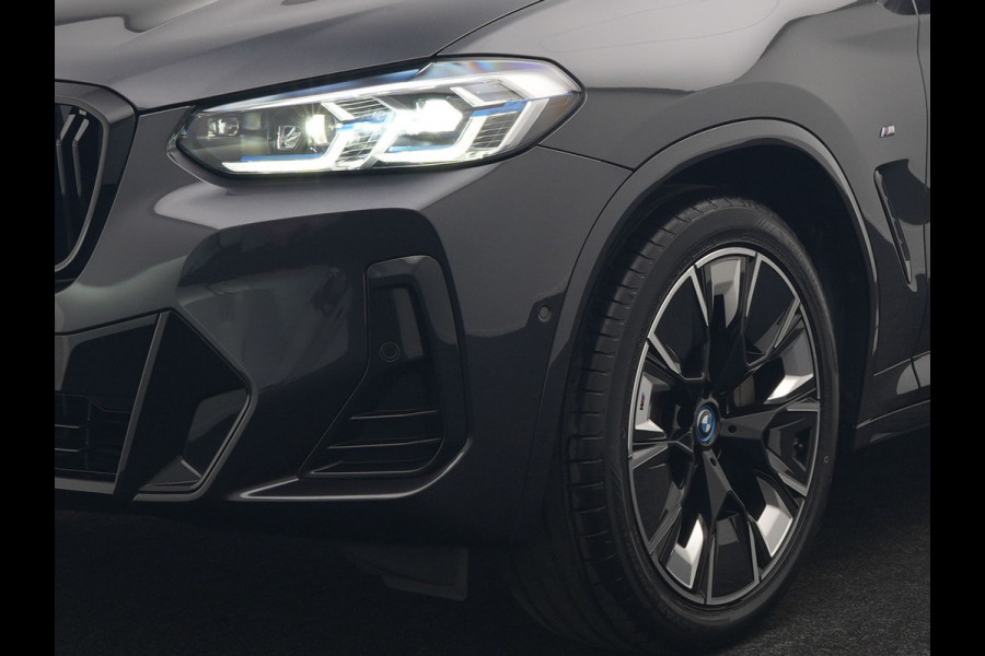 BMW iX3 M Sport 80 kWh 286pk Dealer O.H. | Trekhaak Af Fabriek | Panodak | Head Up | Adaptive Cruise | 360 Camera | Harman / Kardon | Lederen Sportstoelen Memory & Verwarmd | Laser LED | Stuur Verwarmd | Keyless | Blis | Sfeerverlichting | 20"L.M |
