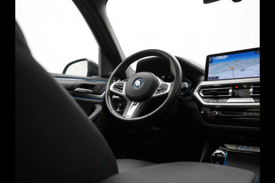 BMW iX3 M Sport 80 kWh 286pk Dealer O.H. | Trekhaak Af Fabriek | Panodak | Head Up | Adaptive Cruise | 360 Camera | Harman / Kardon | Lederen Sportstoelen Memory & Verwarmd | Laser LED | Stuur Verwarmd | Keyless | Blis | Sfeerverlichting | 20"L.M |