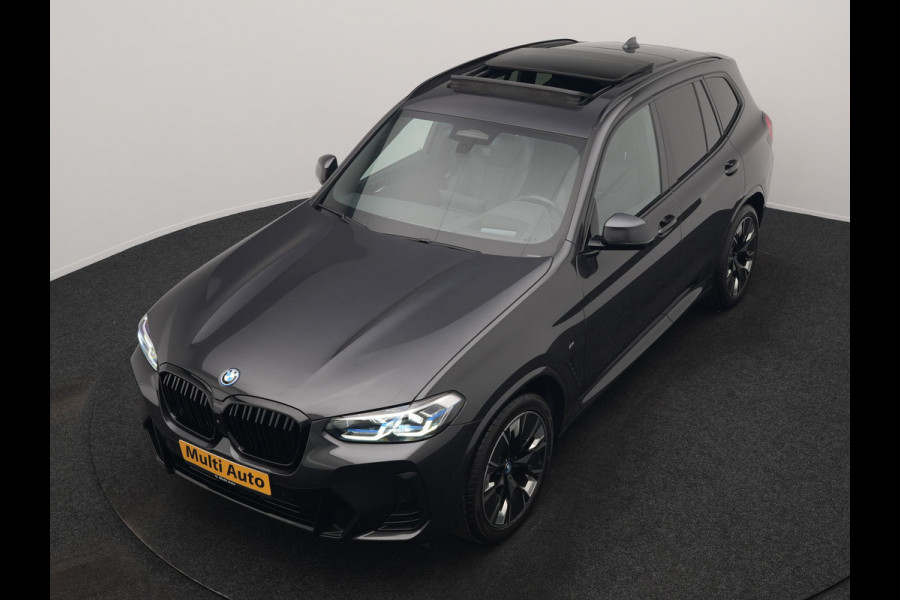 BMW iX3 M Sport 80 kWh 286pk Dealer O.H. | Trekhaak Af Fabriek | Panodak | Head Up | Adaptive Cruise | 360 Camera | Harman / Kardon | Lederen Sportstoelen Memory & Verwarmd | Laser LED | Stuur Verwarmd | Keyless | Blis | Sfeerverlichting | 20"L.M |