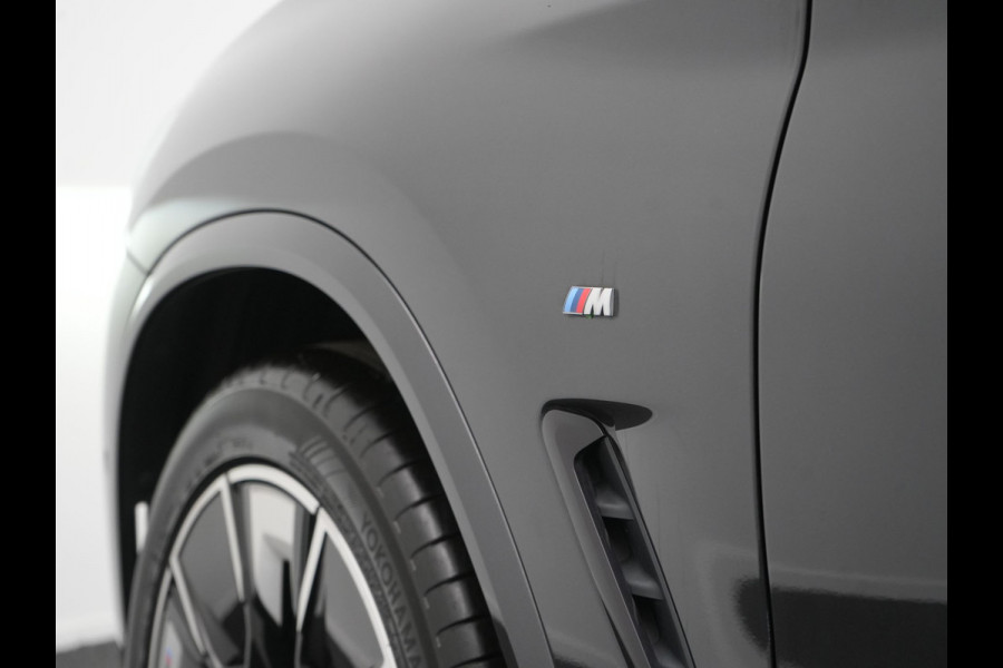 BMW iX3 M Sport 80 kWh 286pk Dealer O.H. | Trekhaak Af Fabriek | Panodak | Head Up | Adaptive Cruise | 360 Camera | Harman / Kardon | Lederen Sportstoelen Memory & Verwarmd | Laser LED | Stuur Verwarmd | Keyless | Blis | Sfeerverlichting | 20"L.M |