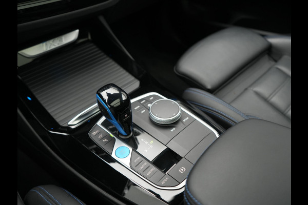 BMW iX3 M Sport 80 kWh 286pk Dealer O.H. | Trekhaak Af Fabriek | Panodak | Head Up | Adaptive Cruise | 360 Camera | Harman / Kardon | Lederen Sportstoelen Memory & Verwarmd | Laser LED | Stuur Verwarmd | Keyless | Blis | Sfeerverlichting | 20"L.M |