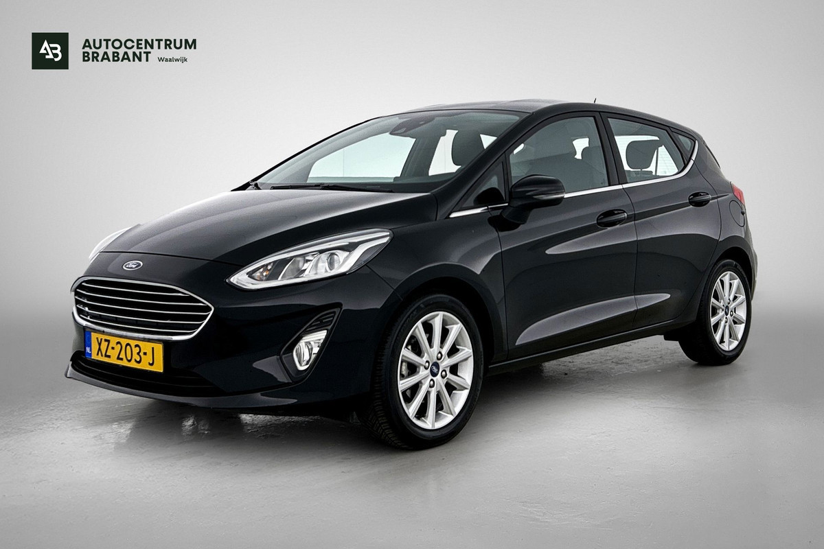 Ford Fiesta 1.0 EcoBoost Titanium (NAVIGATIE, CARPLAY, STUURBEDIENING, LM VELGEN., 1e EIGENAAR, DEALER ONDERHOUDEN)