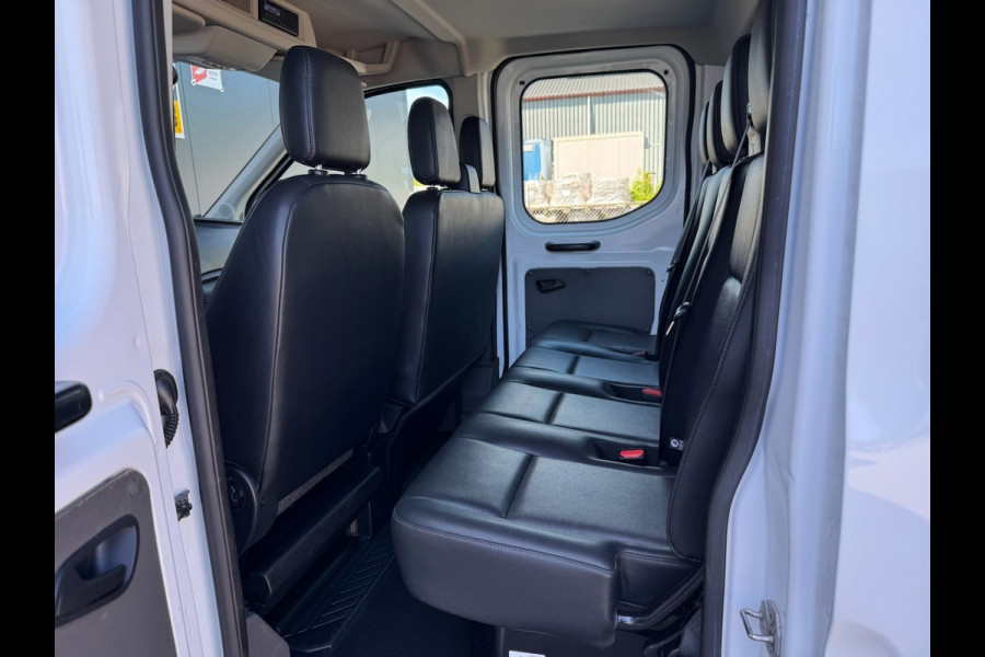 Ford Transit 310 2.0 TDCI 130pk L2H1 DC Trend | Open Laadbak | Trekhaak 2550KG | Airco | Kunstleder | Bluetooth | 7-persoons