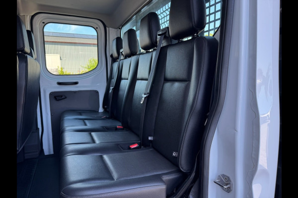 Ford Transit 310 2.0 TDCI 130pk L2H1 DC Trend | Open Laadbak | Trekhaak 2550KG | Airco | Kunstleder | Bluetooth | 7-persoons
