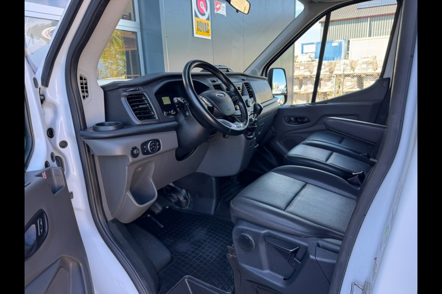 Ford Transit 310 2.0 TDCI 130pk L2H1 DC Trend | Open Laadbak | Trekhaak 2550KG | Airco | Kunstleder | Bluetooth | 7-persoons