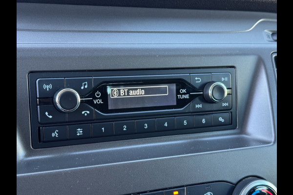 Ford Transit 310 2.0 TDCI 130pk L2H1 DC Trend | Open Laadbak | Trekhaak 2550KG | Airco | Kunstleder | Bluetooth | 7-persoons