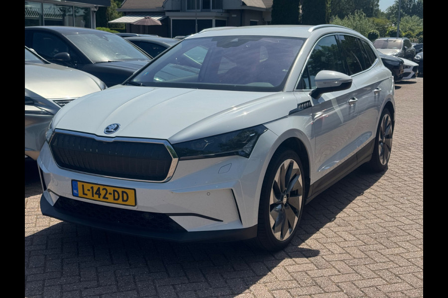 Škoda ENYAQ iV 80 First Edition / SoH 91,4% / Trekhaak / Camera / Leder / CarPlay / Keyless / 21'' / Warmtepomp / Stuur+Stoelverwarming / Dodehoek / DAB / ACC