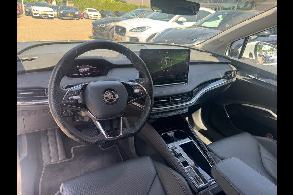 Škoda ENYAQ iV 80 First Edition / SoH 91,4% / Trekhaak / Camera / Leder / CarPlay / Keyless / 21'' / Warmtepomp / Stuur+Stoelverwarming / Dodehoek / DAB / ACC