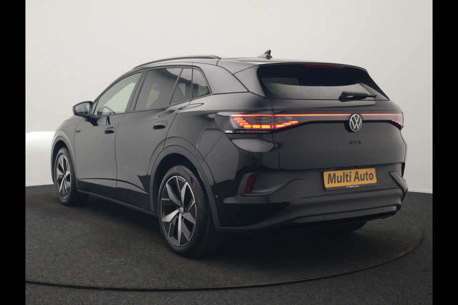Volkswagen ID.4 GTX 4Motion 77 kWh 299pk Dealer O.H. | Panodak | Adaptive Cruise | Head Up | 360 Camera | Alcantara Sportstoelen Massage & Memory | IQ Light | Sfeerverlichting | Keyless | Blis | Stoelen & Stuur Verwarmd | Apple Carplay |