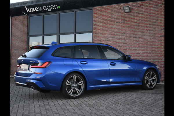 BMW 3 Serie Touring 330e xDrive M-Sport Pano Trekh El-zetels HUD Laser 19inch Adp-onderstel