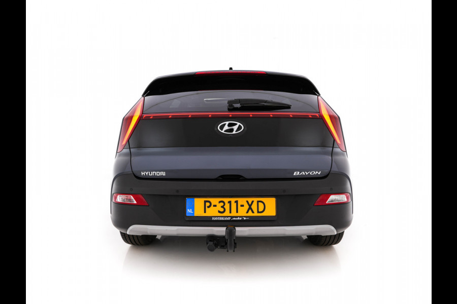 Hyundai Bayon 1.0 T-GDI Premium Sky MHEV (INCL-BTW) *PANO | ADAPTIVE-CRUISE | FULL-LED | BOSE-SOUND | BLINDSPOT | DIGI-COCKPIT | HEATED-SPORTSEATS | CAMERA | DAB | KEYLESS | PRIVACYGLASS | TOWBAR | 16''ALU*