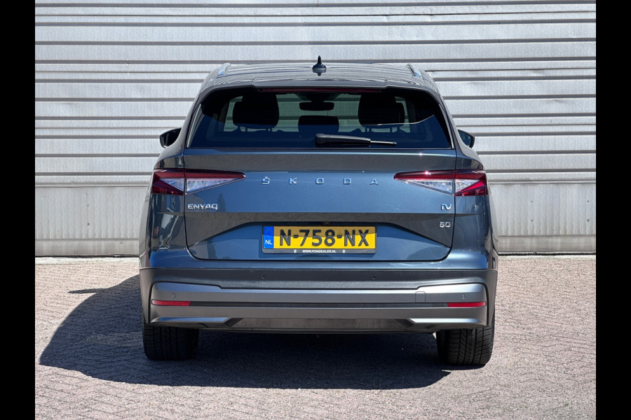 Škoda ENYAQ iV 60|SOH 90%|Warmtepomp|Trekhaak|Panoramadak|ACC|Camera