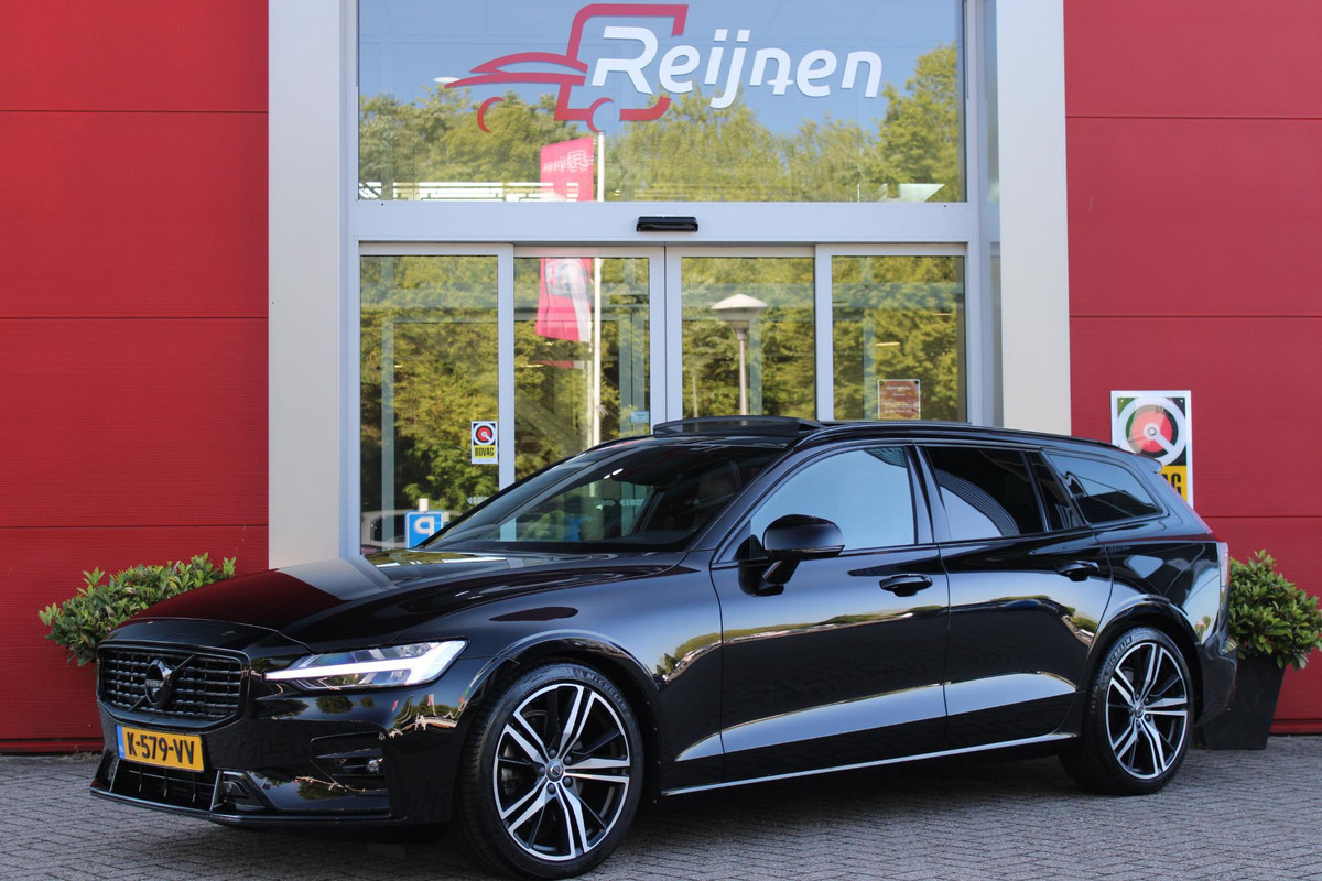Volvo V60 2.0 B4 211PK R-DESIGN AUTOMAAT 8 PANORAMISCH SCHUIF/KANTELDAK | PARKEERVERWARMING MET TIMER (STANDKACHEL) | PREMIUM AUDIO BY HARMAN KARDON | 19" 5-TRIPPLE SPAAKS BLACK/DIAMAND CUT LICHTMETALEN VELGEN | BLINDSPOT INFOMATION SYSTEM "BLIS" (DODEHOEKDETECTIE) | VISUAL PARK ASSIST - CAMERA EN PARKEERHULP VOOR + ACHTER INCL. 360 GRADEN VIEW | VERWARMDE AQUABLADE RUITENWISSERBLADEN | PILOT ASSIST | APPLE CARPLAY / ANDROID AUTO | ADAPTIEVE CRUISECONTROL | R-DESIGN BEKLEDING MET NAPPA LEDER I.C.M. OPEN GRID TEXTIEL | ELEKTRISCH VERSTELBARE CONTOUR STOELEN (SPORTSTOELEN) MET GEH