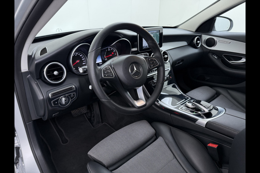 Mercedes-Benz C-Klasse Estate 180T 157PK Automaat Trekhaak Adap.Cruise Comfort-Stoelen Distronic Plus Navi Ecc Pdc Premium Plus Led Stoelverwarming Elek.Stoelen Elek.Achterklep Isofix Lmv 19" Bluetooth