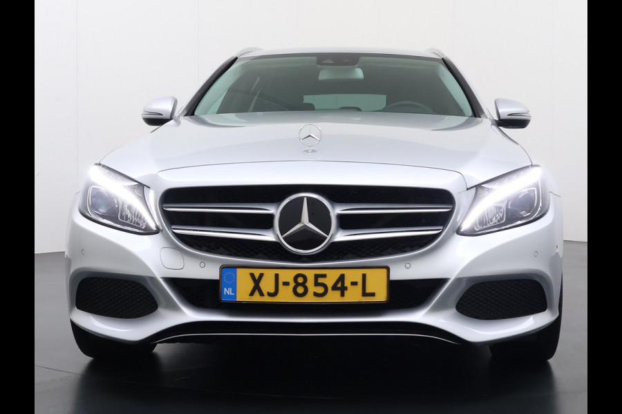 Mercedes-Benz C-Klasse Estate 180T 157PK Automaat Trekhaak Adap.Cruise Comfort-Stoelen Distronic Plus Navi Ecc Pdc Premium Plus Led Stoelverwarming Elek.Stoelen Elek.Achterklep Isofix Lmv 19" Bluetooth