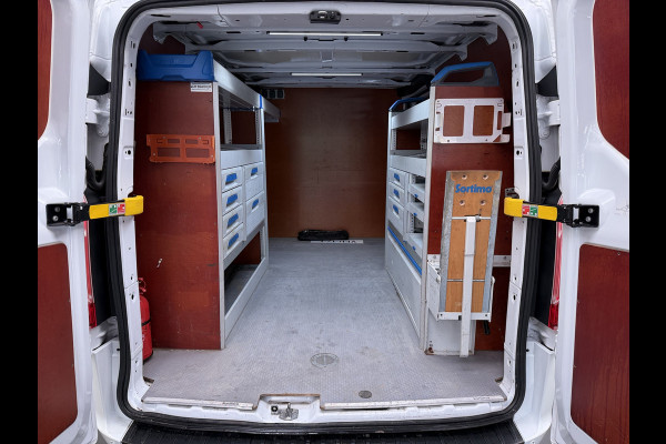 Ford Transit Custom 340 2.0TDCI 130PK L2H1 Sortimo Inperiaal+Ladder Trekhaak Cruise Control Airco Stoelverwarming Pdc Trend Betonplex Vloer Wandbetimmering Inbouwkasten Led
