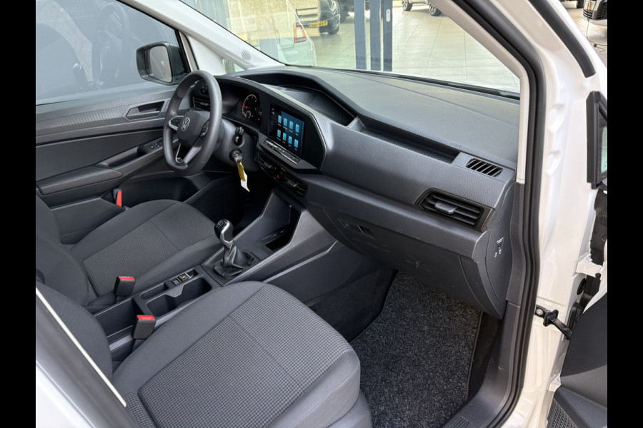 Volkswagen Caddy Cargo 2.0 TDI Airco - Apple carplay - Navigatie - Parkeersensor achter - Zijschuifdeur rechts - Tussenschot volledig - Cruise control - Mistlampen - Bluetooth - Stuur multifunctioneel - Elektrische ramen - Start/stop systeem