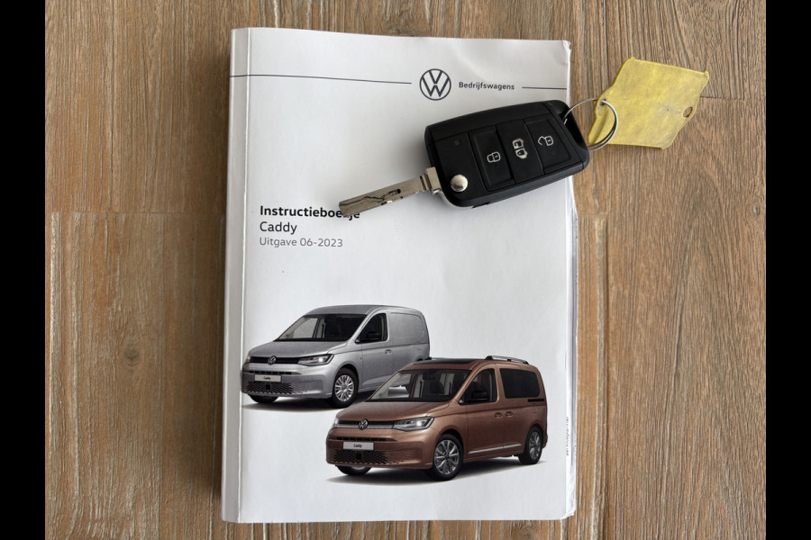 Volkswagen Caddy Cargo 2.0 TDI Airco - Apple carplay - Navigatie - Parkeersensor achter - Zijschuifdeur rechts - Tussenschot volledig - Cruise control - Mistlampen - Bluetooth - Stuur multifunctioneel - Elektrische ramen - Start/stop systeem