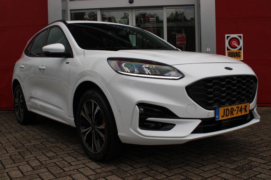 Ford Kuga 2.5 PHEV 225PK ST-LINE X | ELEKTRISCH WEGKLAPBARE TREKHAAK | NAVIGATIE | WINTER PACK: VOORRUIT/STUUR/STOEL VERWARMING | ACHTERBANK VERWARMING | DODEHOEKDETECTIE | CAMERA VOOR + ACHTER | KEYLESS ENTRY/START | RODE REMKLAUWEN | ADAPTIVE CRUISE CONTROL | DAB+ RADIO | APPLE CARPLAY/ANDROID AUTO | 19" LICHTMETALEN VELGEN | PARKEERSENSOREN VOOR + ACHTER | AUTOMATISCH INPARKEREN | ELEKTRISCH BEDIENBARE ACHTERKLEP |