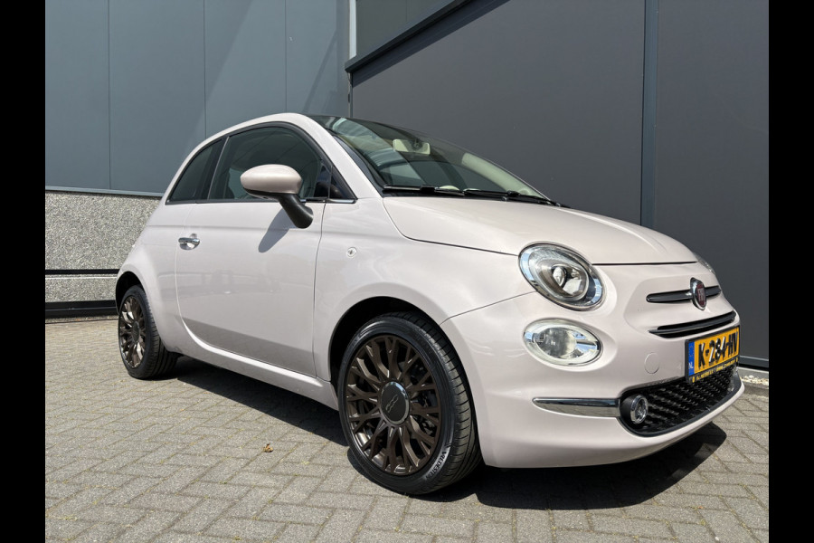 Fiat 500 1.2 Star Powder Pink Glazen panoramadak - Climate control - Parkeersensor achter - Cruise control - Mistlampen - Licht metalen velgen 16 inch - Bluetooth - Radio - Stuur multifunctioneel - Elektrische ramen - Lederen bekleding -  Extra getint glas achter