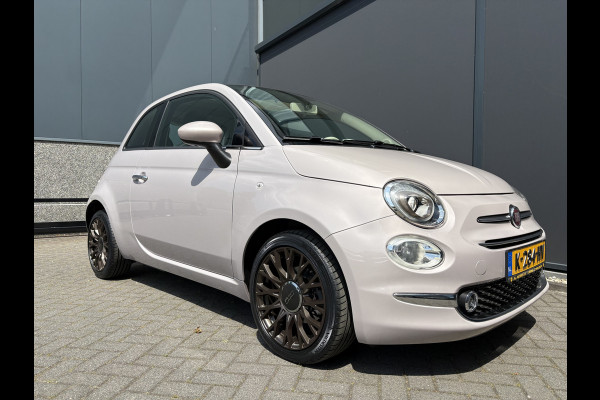 Fiat 500 1.2 Star Powder Pink Glazen panoramadak - Climate control - Parkeersensor achter - Cruise control - Mistlampen - Licht metalen velgen 16 inch - Bluetooth - Radio - Stuur multifunctioneel - Elektrische ramen - Lederen bekleding -  Extra getint glas achter