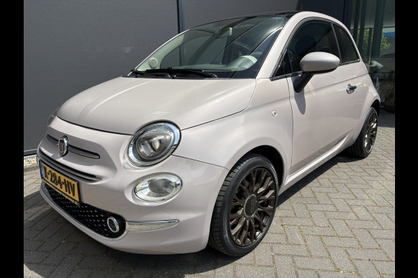 Fiat 500 1.2 Star Powder Pink Glazen panoramadak - Climate control - Parkeersensor achter - Cruise control - Mistlampen - Licht metalen velgen 16 inch - Bluetooth - Radio - Stuur multifunctioneel - Elektrische ramen - Lederen bekleding -  Extra getint glas achter