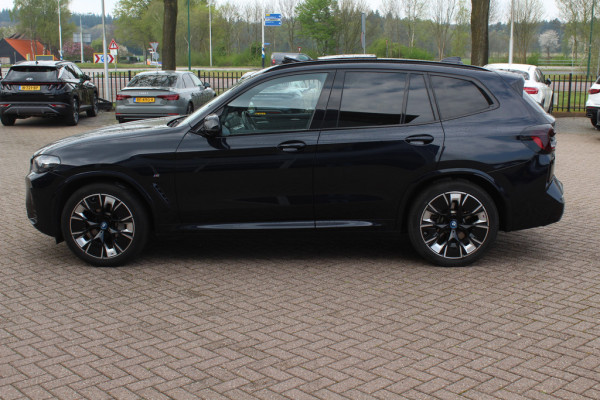 BMW iX3 High Executive 80 kWh / Trekhaak / Panoramadak / 360Camera / Head-up / 20'' / Leder / Harman Kardon / Sfeerverlichting / Dodehoek / DAB / Stoelverwarming / ACC