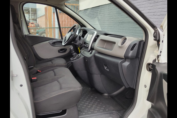 Renault Trafic 1.6 dCi 126PK T29 L2H1 3-Persoons Euro 6 Trekhaak Airco Navi Cruise Control Bluetooth Pdc Comfort Energy Betonplex vloer Wandbetimmering Schuifdeur Achterdeuren Origineel Nederlandse Auto