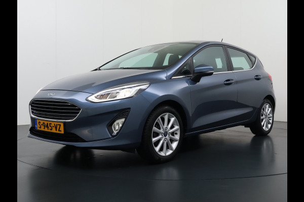Ford Fiesta 1.0T 126PK Titanium Apple Carplay Android Navi LM Airco Stoelverwarming Apps Voorruitverwarming Wifi Mistlampen Chroompack TCS Led Lmv Lane Assist Isofix TCS EAB Hill-Start-Assist Ford-Pass-Connect LED