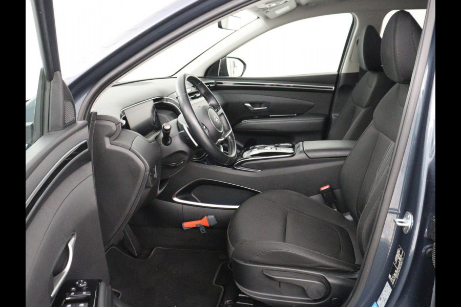 Hyundai Tucson 1.6 T-GDI HEV Comfort | Trekhaak | Stoelverwarming | Adaptive cruise | Carplay | Camera | Navigatie | Keyless | Full LED | 17'' | Parkeerhulp | Climate control | Digital Cockpit
