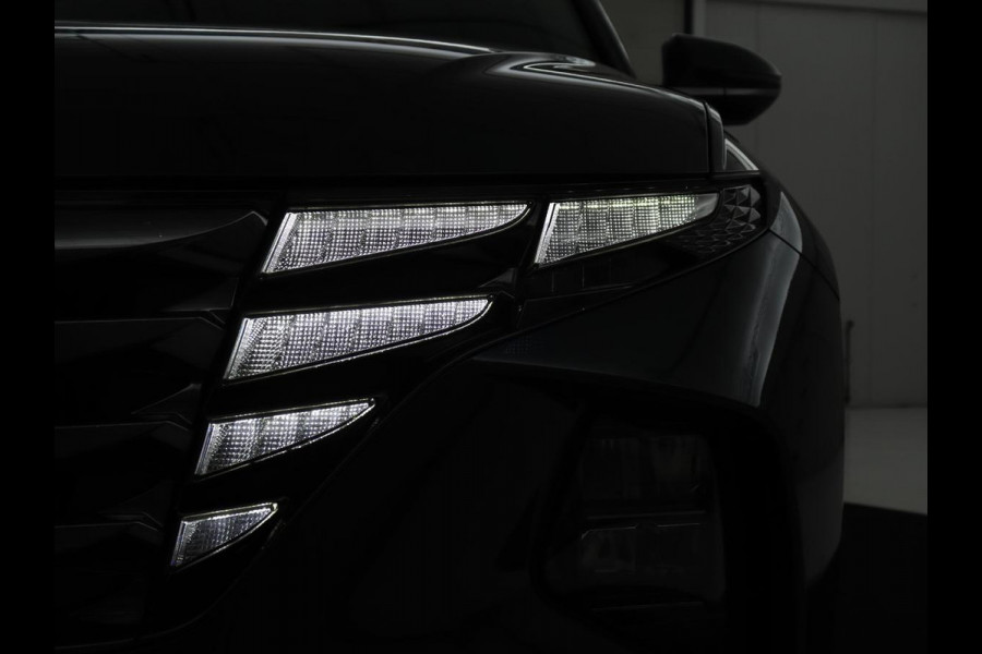 Hyundai Tucson 1.6 T-GDI HEV Comfort | Trekhaak | Stoelverwarming | Adaptive cruise | Carplay | Camera | Navigatie | Keyless | Full LED | 17'' | Parkeerhulp | Climate control | Digital Cockpit
