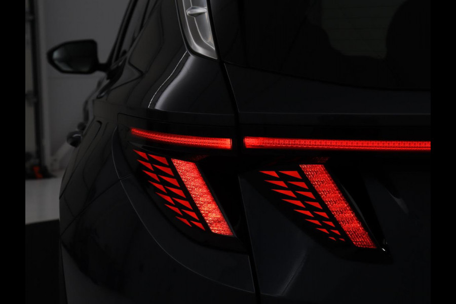 Hyundai Tucson 1.6 T-GDI HEV Comfort | Trekhaak | Stoelverwarming | Adaptive cruise | Carplay | Camera | Navigatie | Keyless | Full LED | 17'' | Parkeerhulp | Climate control | Digital Cockpit